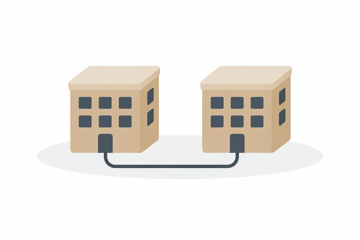 2棟の建物が1本の線でつながっているイラスト