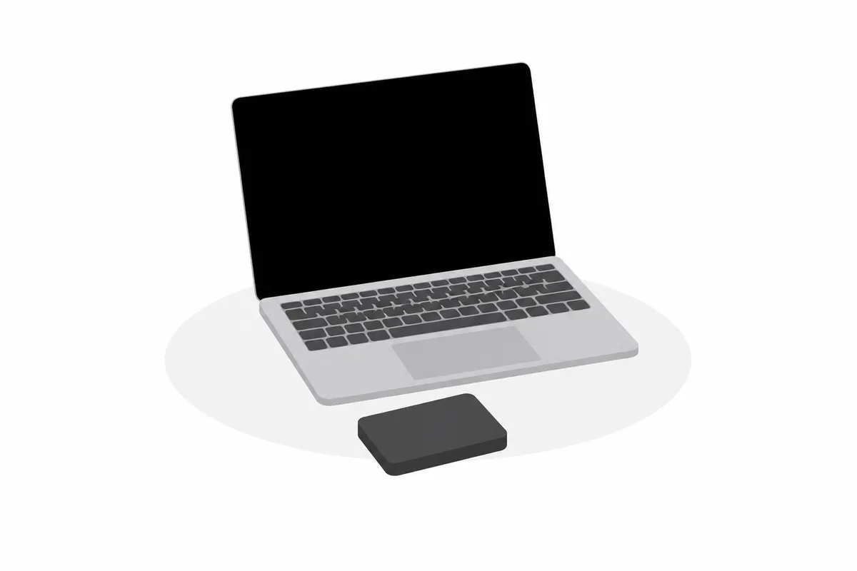ノートパソコンと、取り外したハードディスクのイラスト